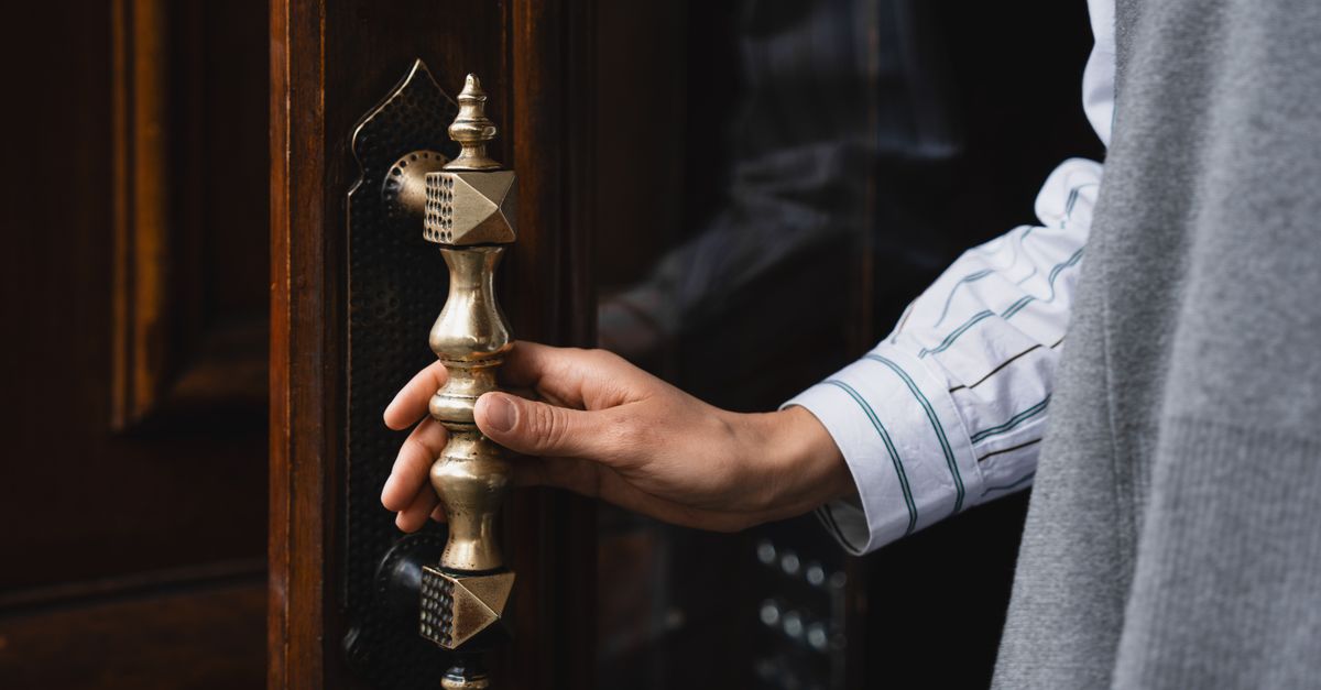 locksmith unlocking front door — 5th Ave Locksmith Brooklyn